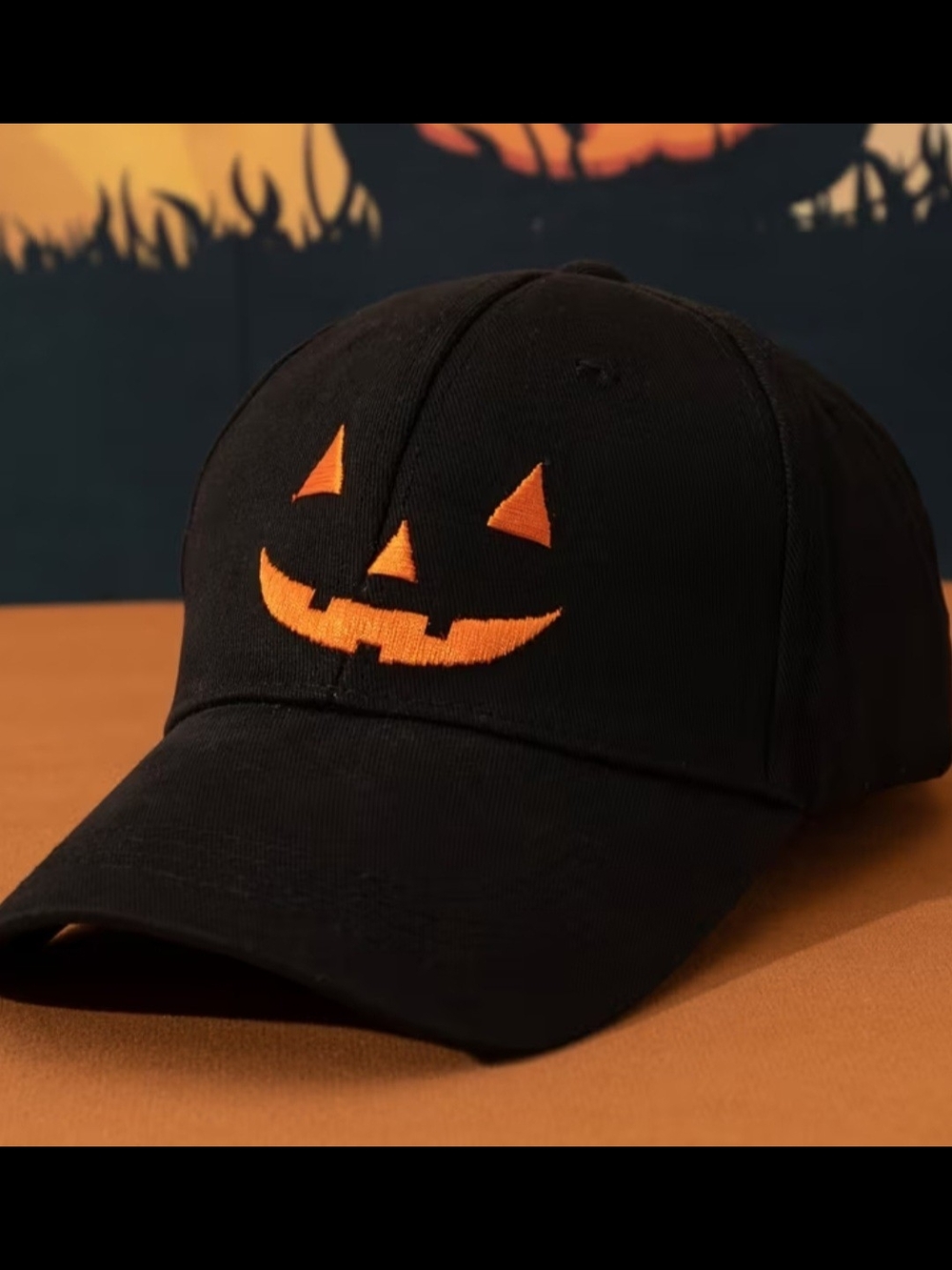 Black Baseball Hat with Orange Jack-O'-Lantern Embroidery